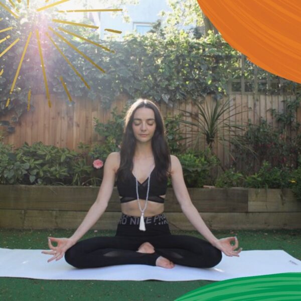 Lady meditating in her garden